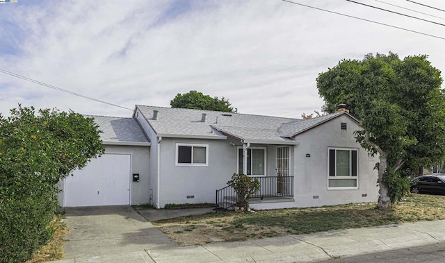 single story home featuring a garage