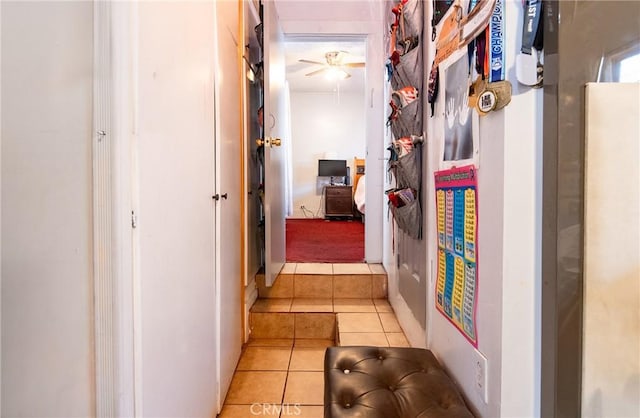 hallway with light tile patterned floors