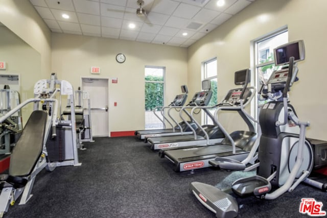 exercise room with a drop ceiling