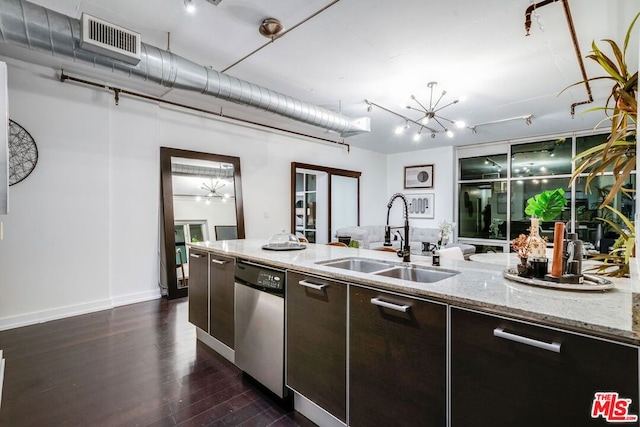 kitchen with dark brown cabinetry, dark wood-type flooring, a notable chandelier, sink, and stainless steel dishwasher