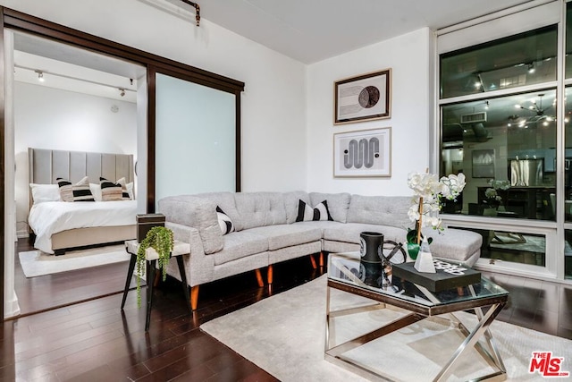 living room with hardwood / wood-style floors