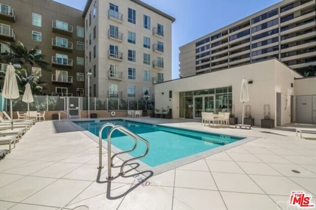 view of pool with a patio area