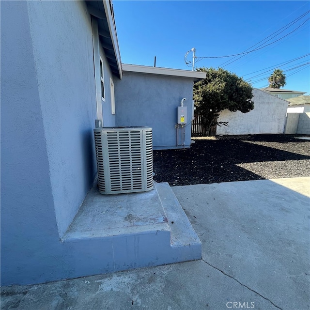 view of property exterior featuring central AC unit