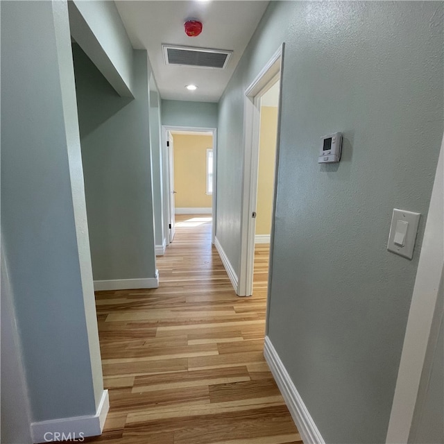 hall featuring light hardwood / wood-style flooring