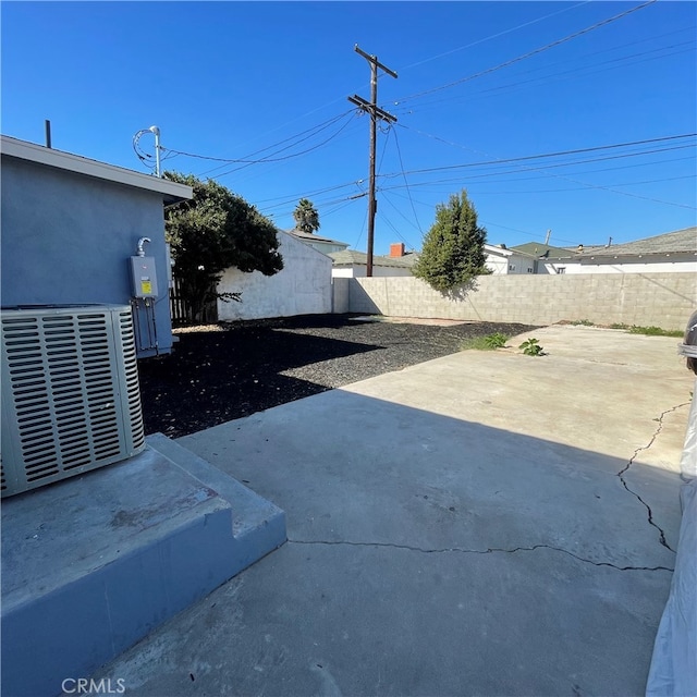 view of yard with a patio area and cooling unit