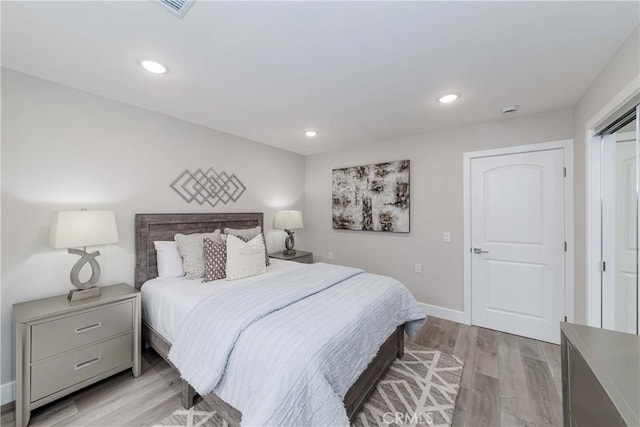 bedroom featuring light hardwood / wood-style flooring