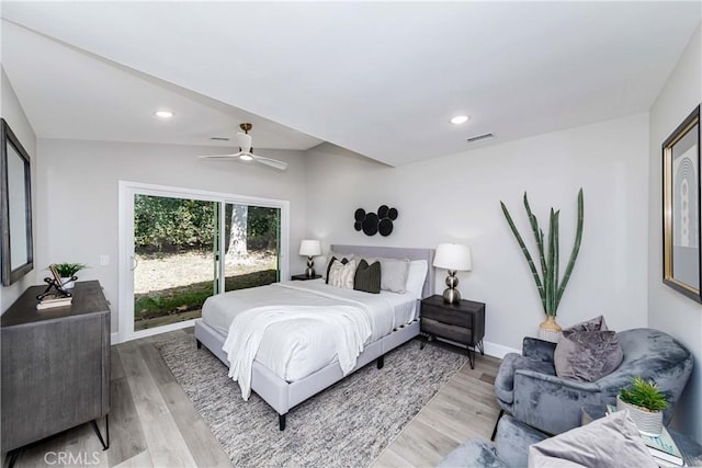 bedroom featuring access to outside, light hardwood / wood-style flooring, ceiling fan, and lofted ceiling