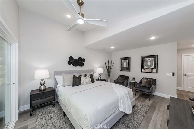 bedroom featuring ceiling fan and light hardwood / wood-style floors