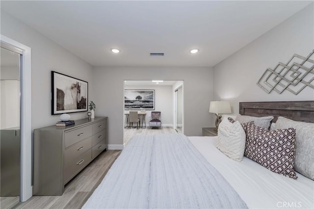 bedroom featuring light wood-type flooring