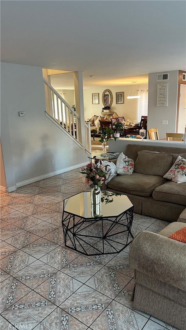 living room featuring light tile patterned floors