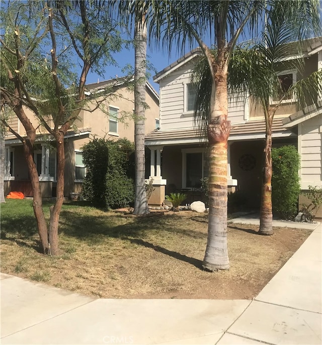 view of front of home with a front lawn