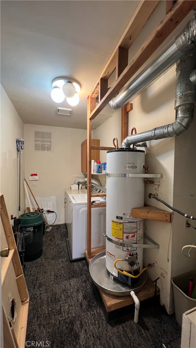 washroom with dark colored carpet, secured water heater, and independent washer and dryer