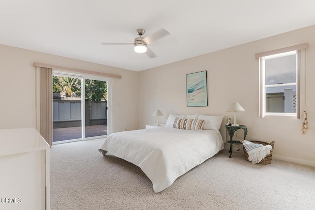 bedroom featuring access to outside, ceiling fan, and carpet floors