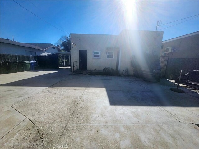 rear view of property with a patio area