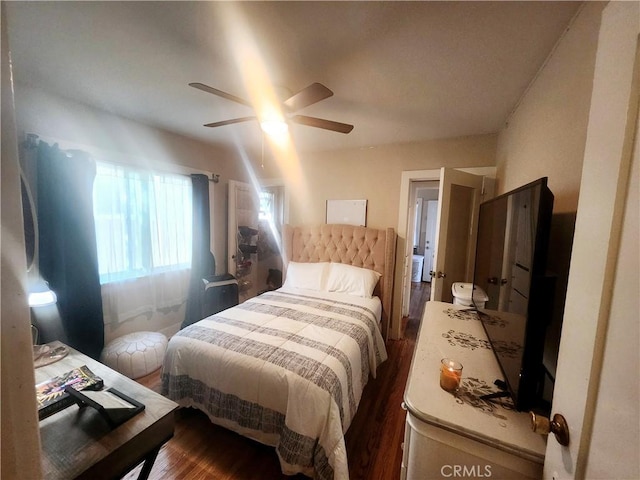 bedroom featuring ceiling fan and dark hardwood / wood-style flooring