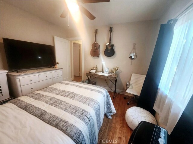 bedroom featuring ceiling fan and wood-type flooring