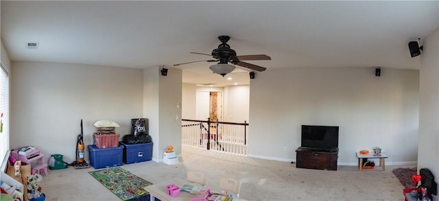 game room featuring carpet flooring and ceiling fan