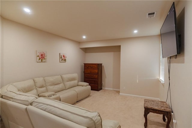 living room featuring light carpet