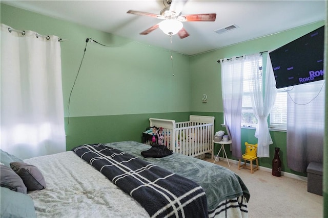 bedroom featuring carpet and ceiling fan