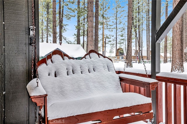 view of snow covered deck