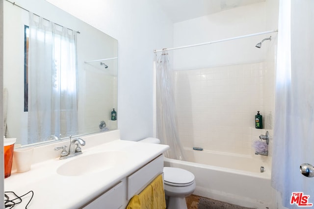 full bathroom with vanity, toilet, and shower / bath combination with curtain