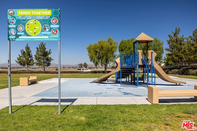 view of jungle gym with a yard