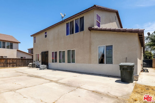 rear view of property with a patio