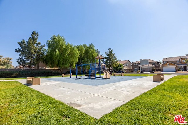 view of jungle gym with a lawn