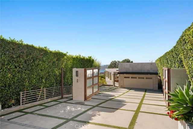 view of patio with a garage