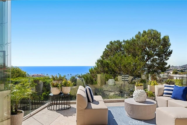 view of patio featuring a water view and an outdoor hangout area