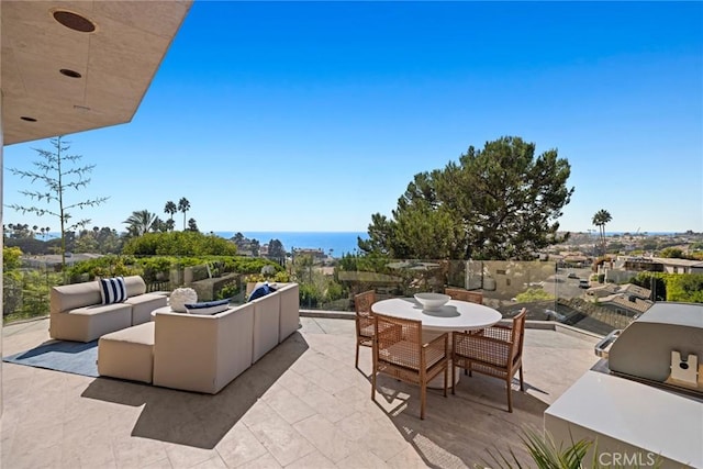 view of patio featuring a water view and an outdoor hangout area