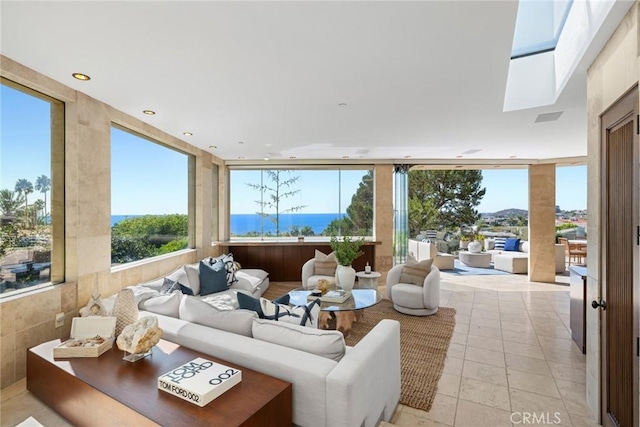 sunroom featuring a skylight