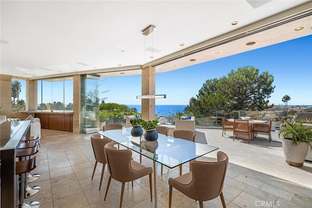 view of patio featuring a water view