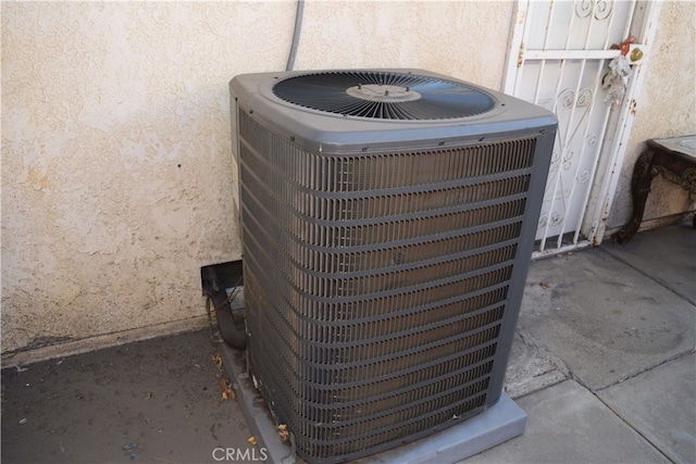 details with central air condition unit and concrete floors