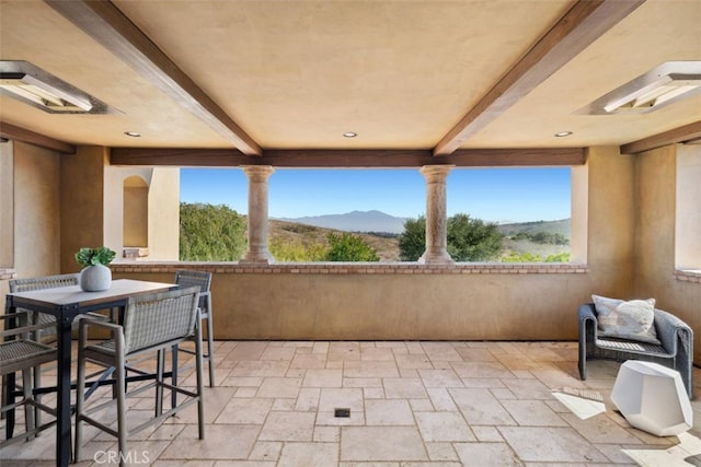 view of patio with a mountain view