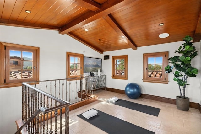 exercise room featuring wood ceiling, vaulted ceiling, and light tile patterned floors