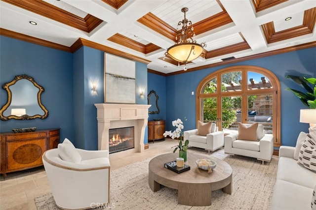 living room featuring ornamental molding, beam ceiling, and coffered ceiling