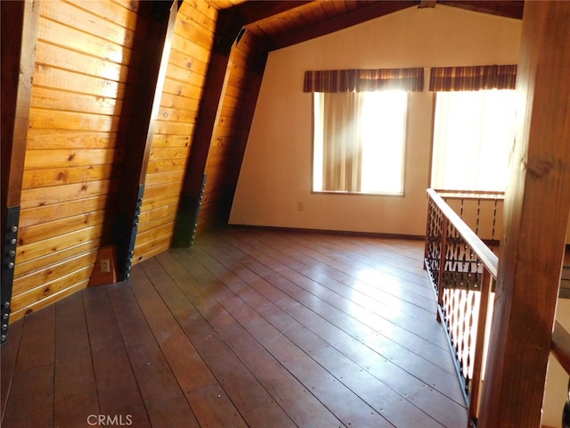 unfurnished room with wood ceiling, vaulted ceiling, and wood-type flooring