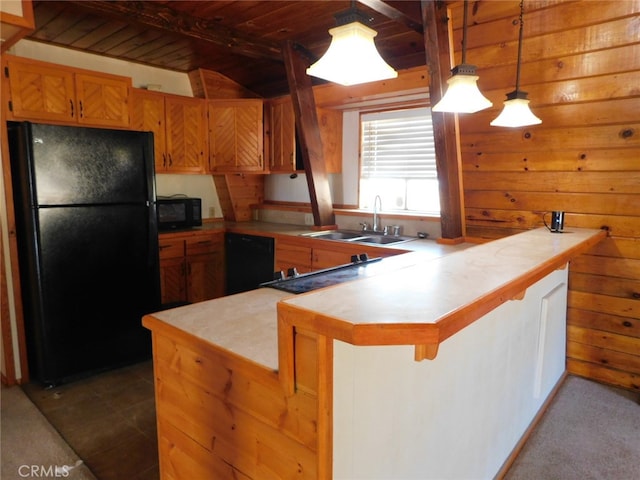 kitchen featuring wooden ceiling, decorative light fixtures, sink, kitchen peninsula, and black appliances