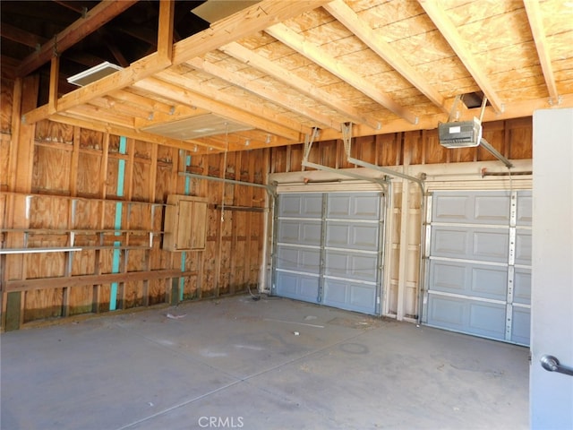 garage featuring a garage door opener