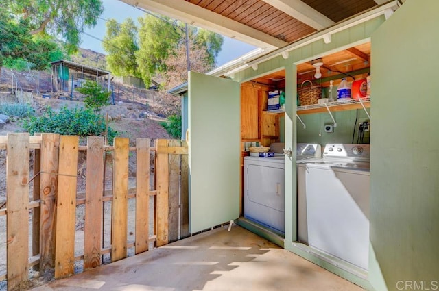 laundry room with independent washer and dryer