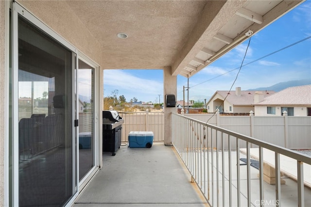 balcony featuring area for grilling