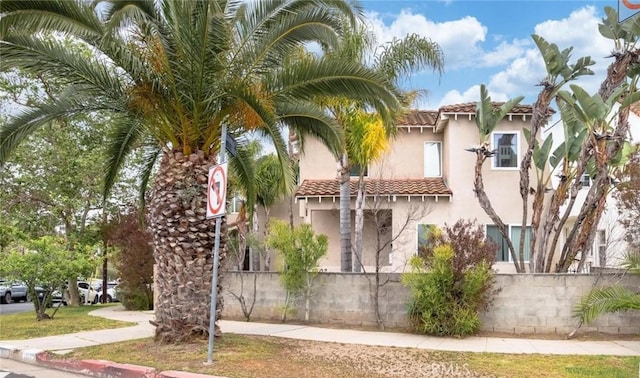view of property featuring fence