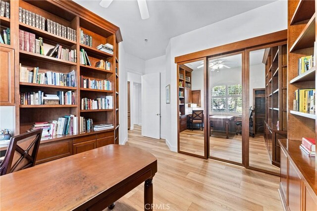 interior space with ceiling fan and light wood-type flooring