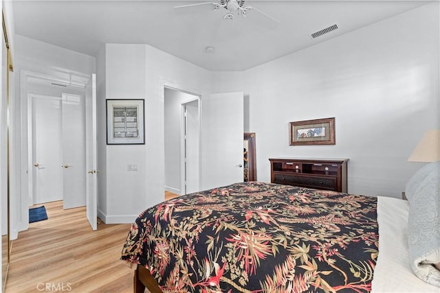 bedroom with ceiling fan and light wood-type flooring