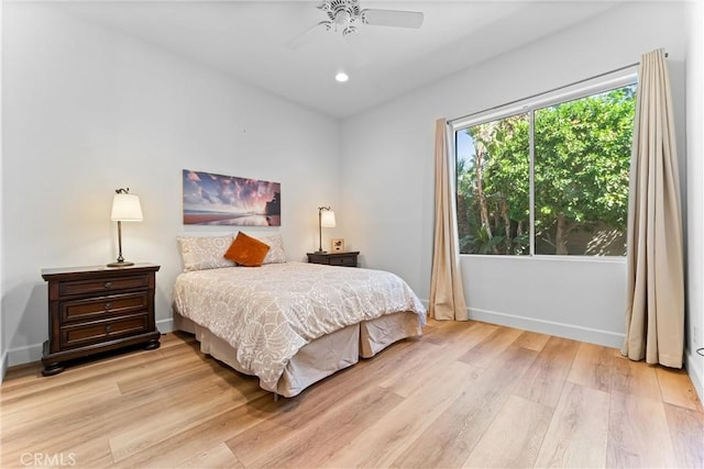 bedroom featuring ceiling fan and light wood-type flooring