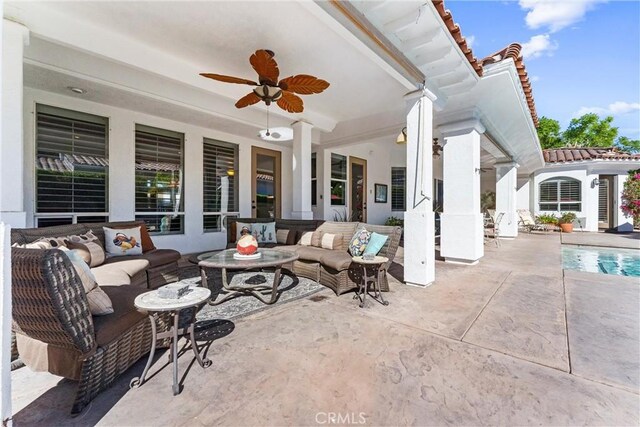 view of patio featuring ceiling fan and outdoor lounge area