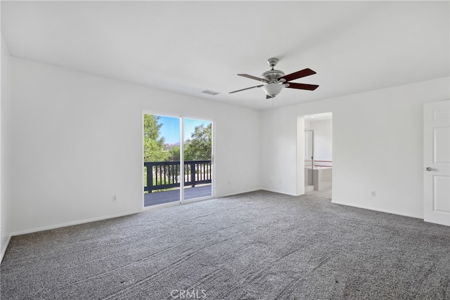 spare room with carpet floors and ceiling fan