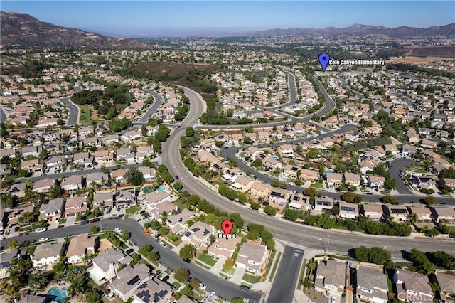 aerial view featuring a mountain view