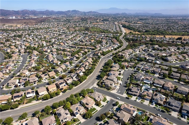 birds eye view of property featuring a mountain view